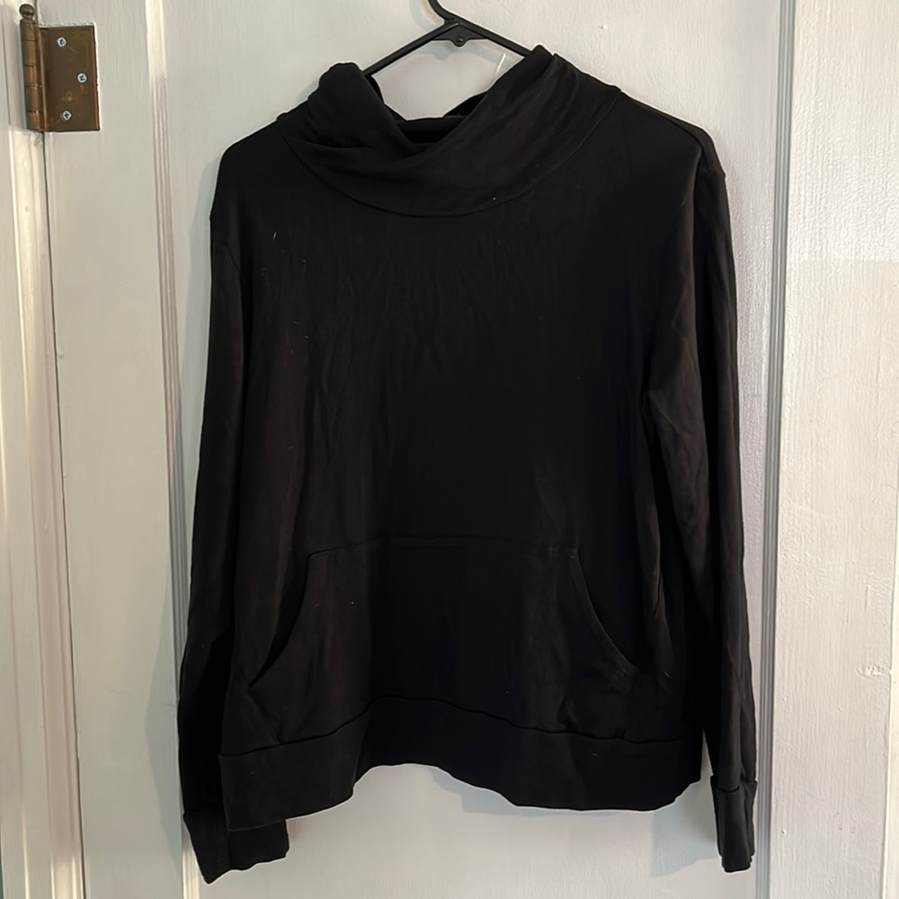 Slouchy neck, casual sweater.